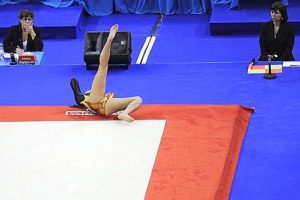 Colombia's Jessica Gil Ortiz falls as she performs in the women's floor event in the apparatus finals during the Artistic Gymnastics World Championships 2009 at the 02 Arena, in east London, on October 18, 2009. AFP PHOTO / Adrian Dennis